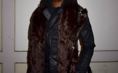 Rema yahishuye impamvu yambaraga imyenda minini akiri muto